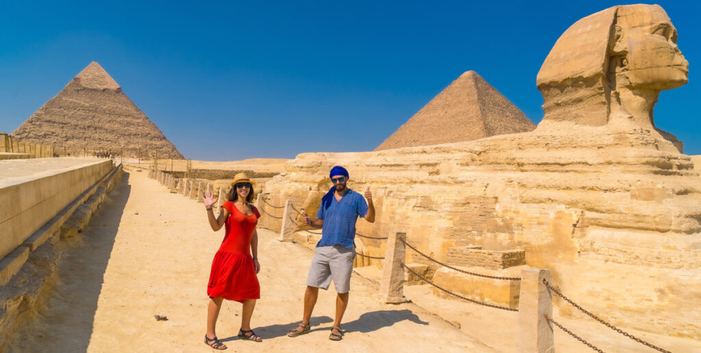 A tourist couple at The Great Sphinx of Giza