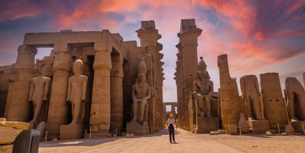 Sculptures of ancient Egyptian pharaohs and drawings