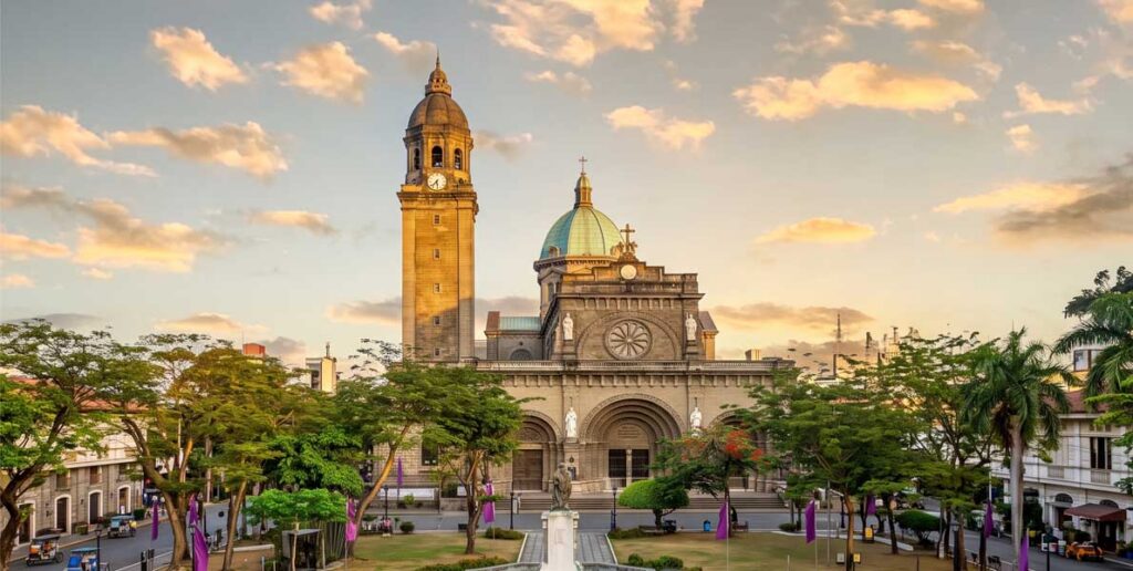 The image shows the historic Manila Cathedral.